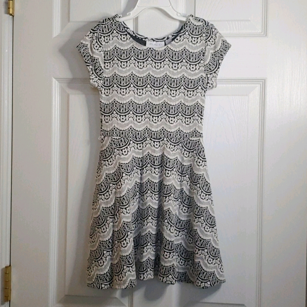 Girls dress with black and white design